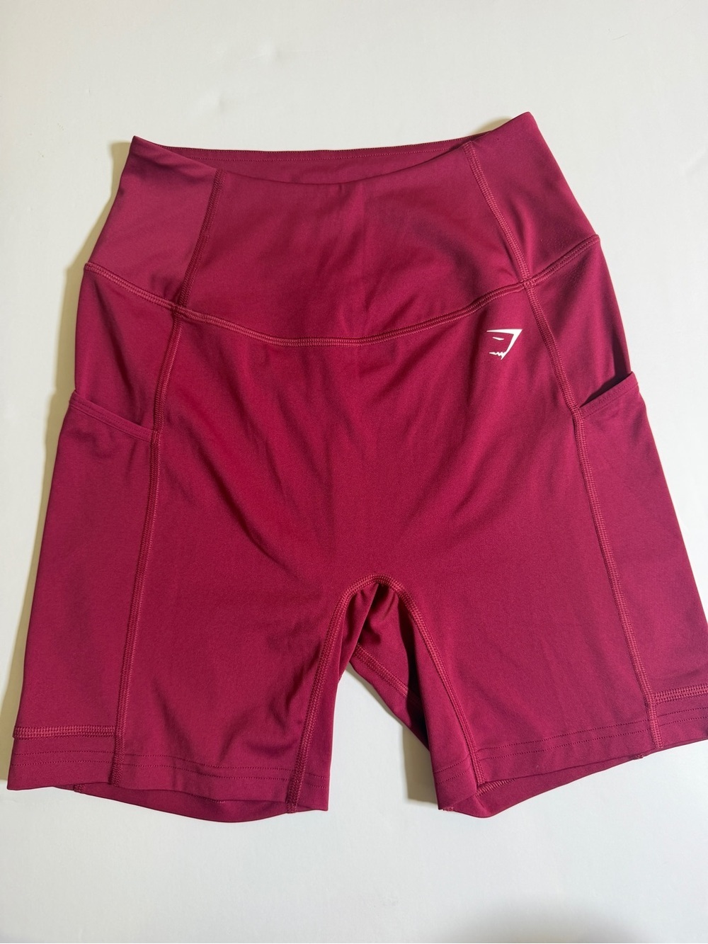 Gymshark High-Waist Berry/Magenta Bike Shorts with Side Pockets